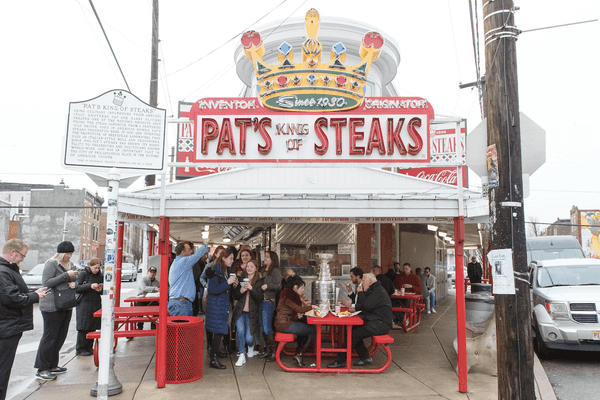 Cheesesteak scrap! Hooded punk caught on video chucking sandwich at manager of famous Philly cheesesteak stand. Yuge mistake.