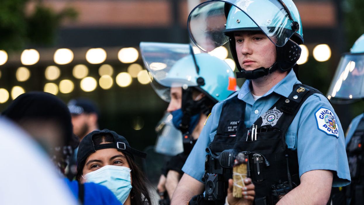 Chicago police union boss says cops could be booted if they kneel with protesters