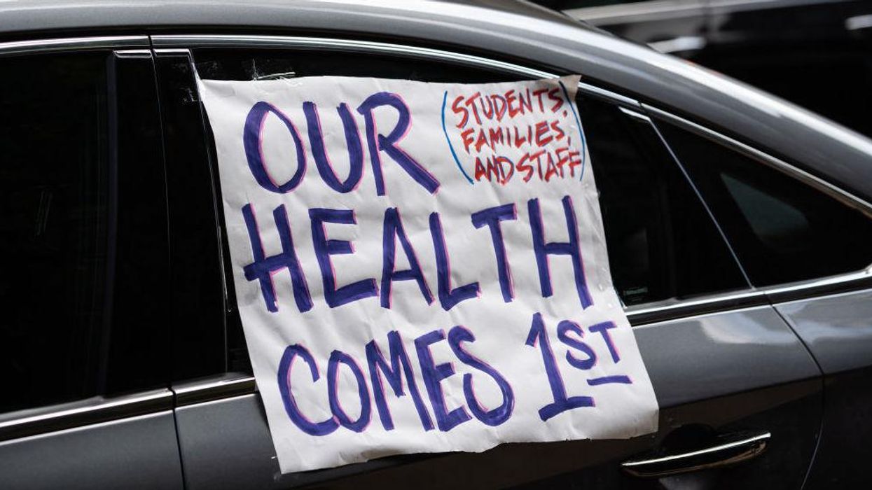 Chicago Teachers Union votes to defy school reopening plan, potentially voiding union contract