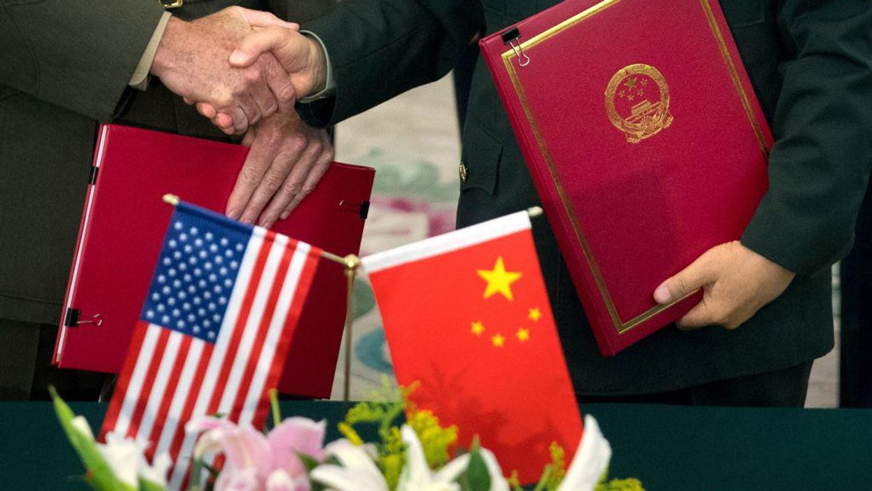 Chinese officials scramble to find ways to insulate China's economy from Western sanctions as tensions with Taiwan grow