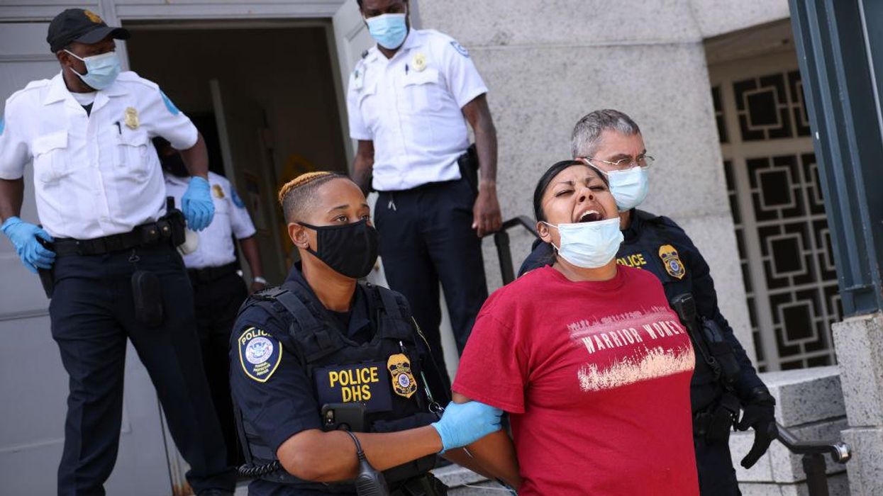 Climate change activists storm and take over Department of Interior building