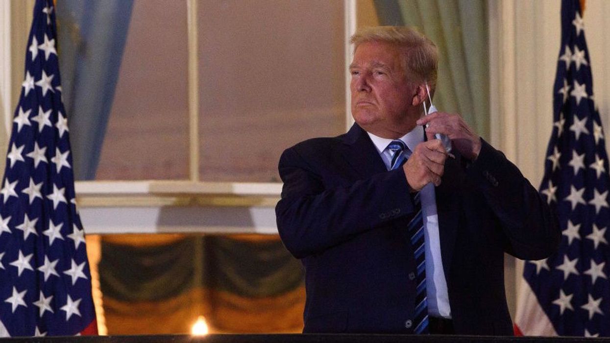 CNN host panics over clip of Trump removing face mask: 'That's going to kill people'