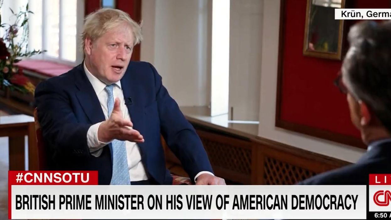 CNN tries to get Boris Johnson to bash the US — but he refuses to take the bait: 'A shining city on a hill'