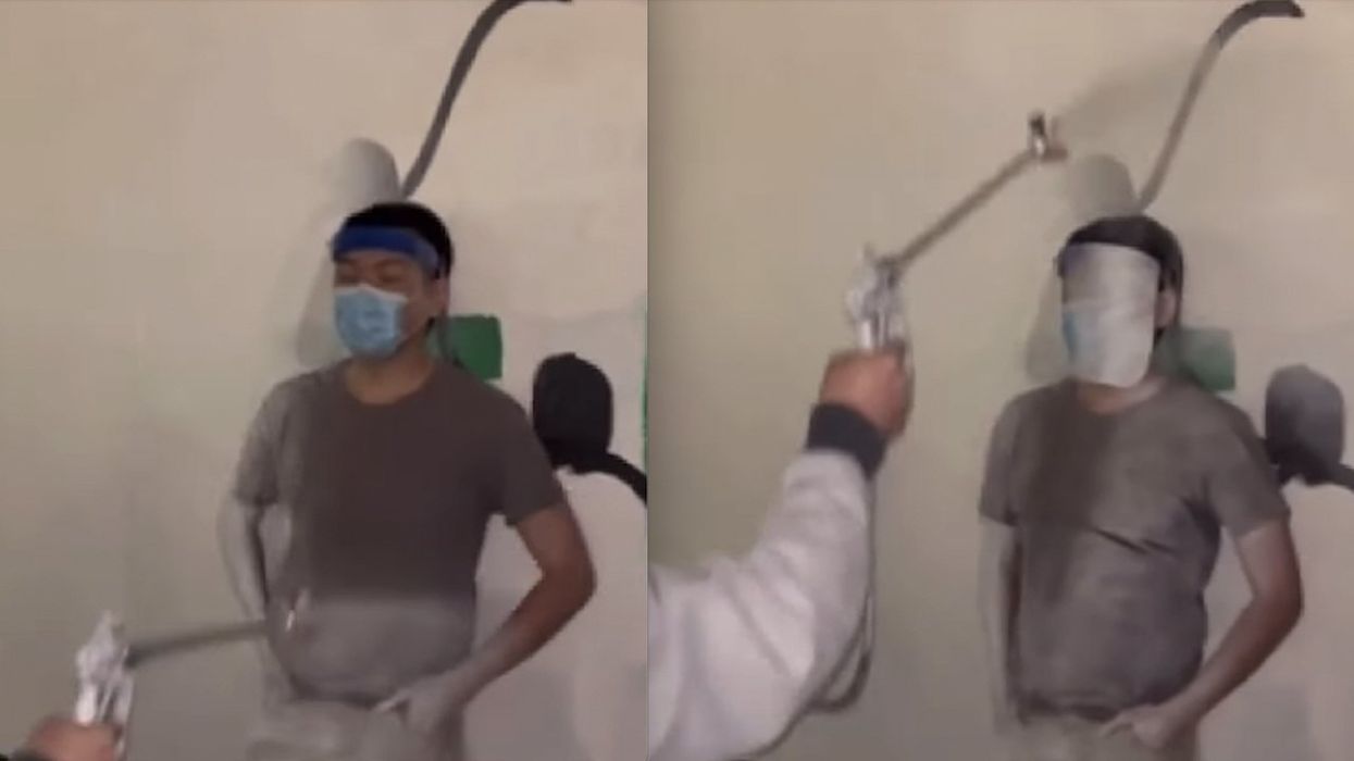 College paints over anti-Semitic messages on walls; protesting students stand in way — and get themselves some primer