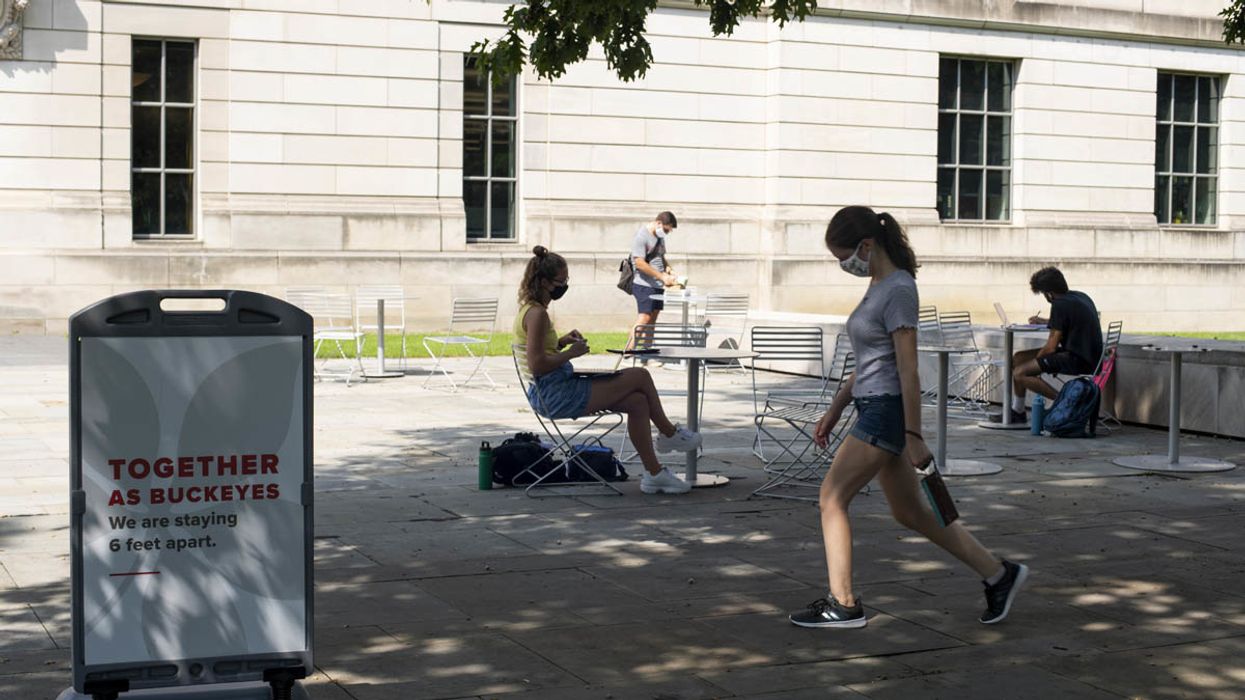 College students in masks and social distancing