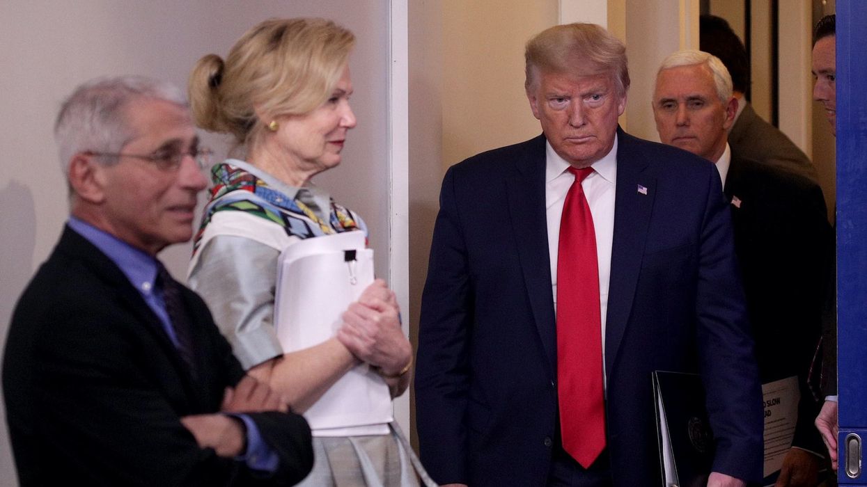 Commentary: Trump is in danger of turning coronavirus into his Iraq