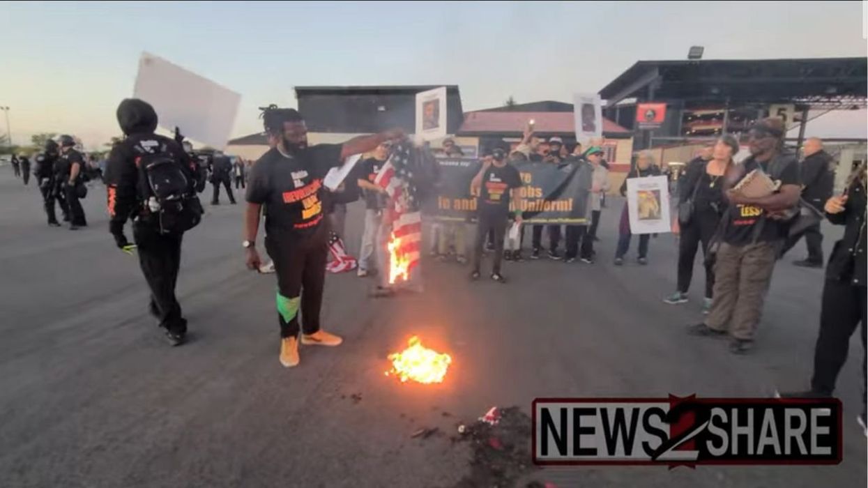 Communists burn American flags outside Jason Aldean concert to protest singer's patriotic song