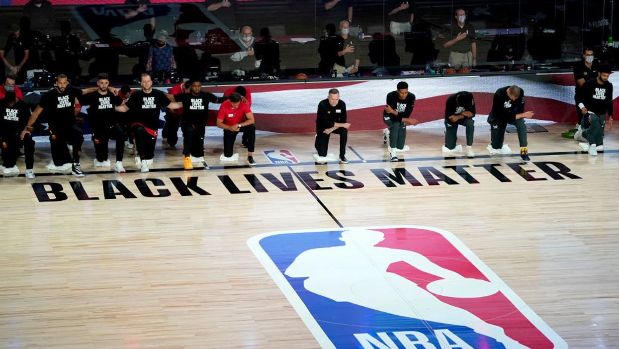 Construction company gives up Utah Jazz suite, slams NBA's anthem kneeling and 'divisive' BLM 'propaganda'