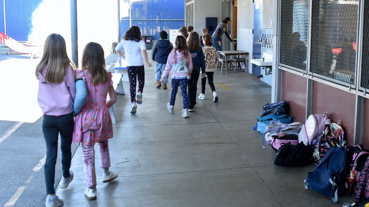 Cop caught having sex with married teacher in her classroom while on duty; bodycam video captured flirting