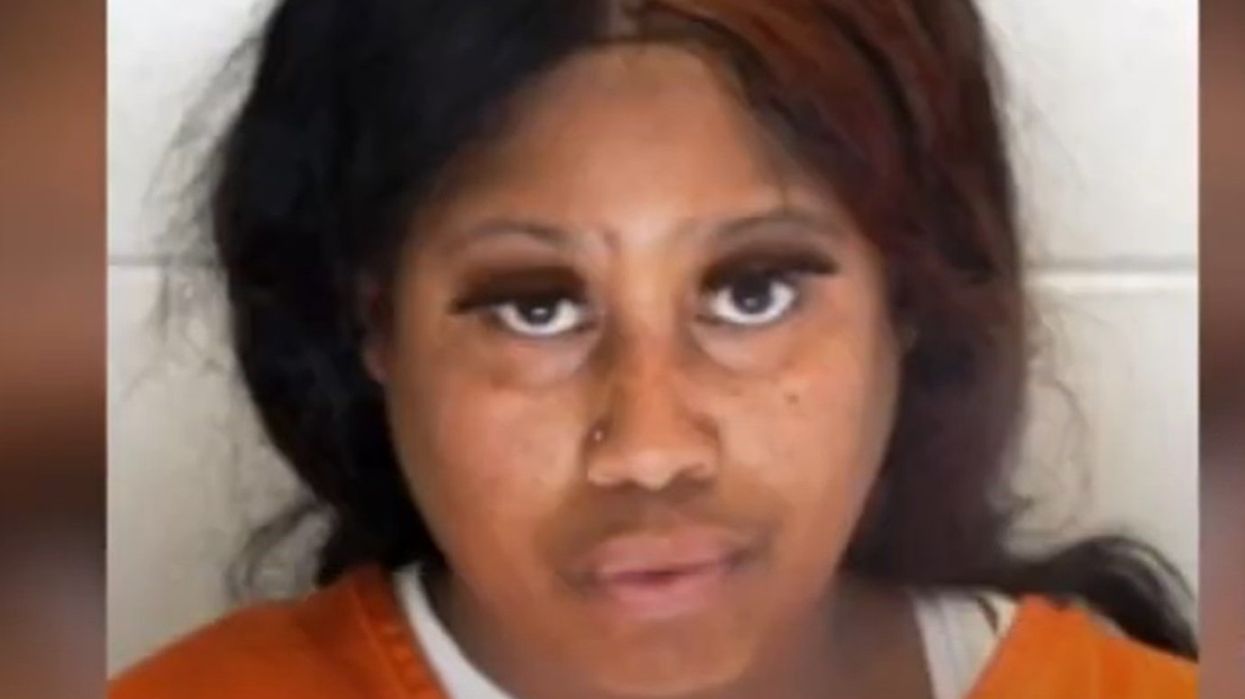 Cop hauled away to jail in her police cruiser after she allegedly stole a pair of shoes — while in uniform