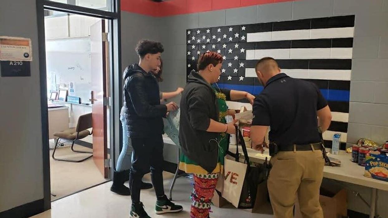 Cops and students came together years ago to paint a Thin Blue Line mural at their high school. Now activists claim it has racist connotations and want it gone.