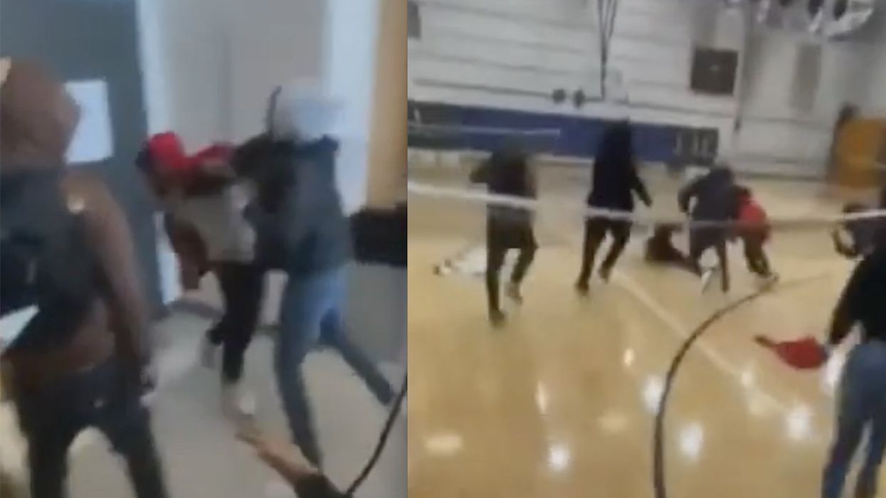 Cops charge 14-year-old male with murder after 15-year-old male fatally stabbed during brawl in high school caught on video
