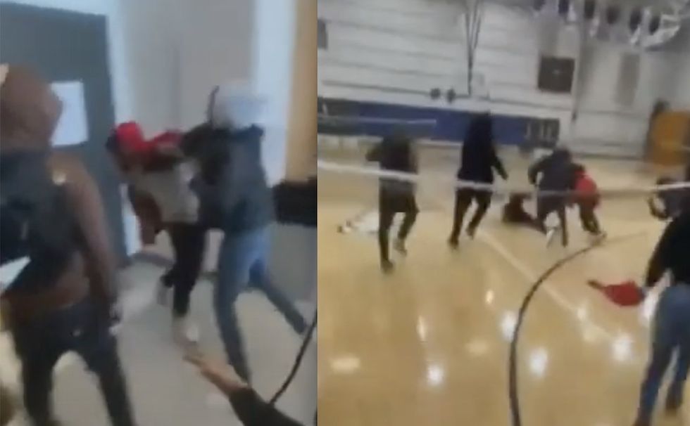 Cops charge 14-year-old male with murder after 15-year-old male fatally stabbed during brawl in high school caught on video