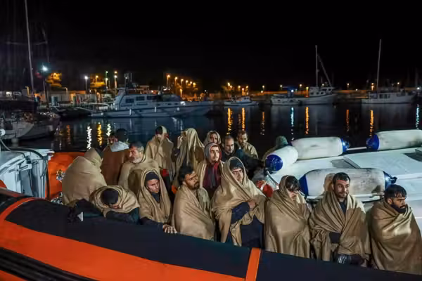 Corpse of Scottish woman who helped asylum-seekers stuffed into suitcase by migrant, say police
