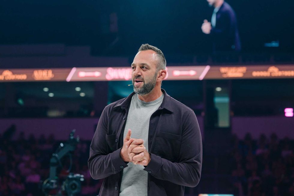 Costi Hinn makes history at Share the Arrows, urges wives to be 'crowns'