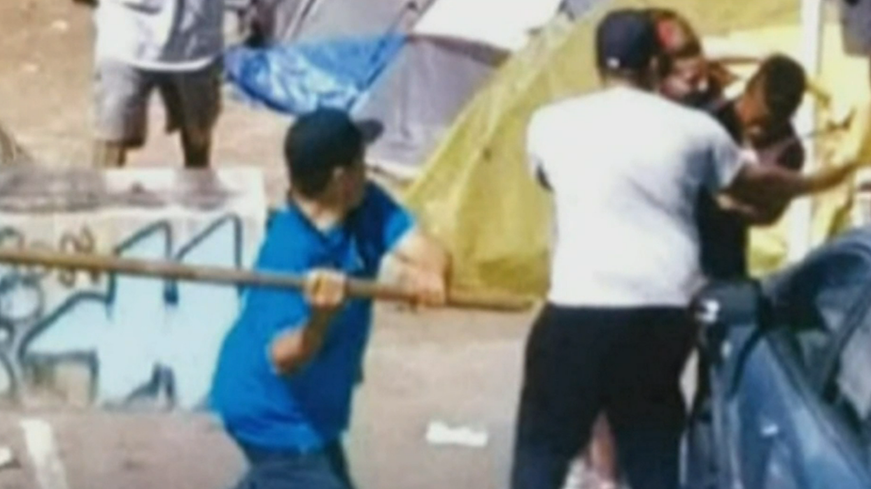 Couple attacked with machete, rocks, and 5-foot wooden pole while retrieving stolen goods from Seattle homeless camp. As they tried to get away, they hit and killed a man.