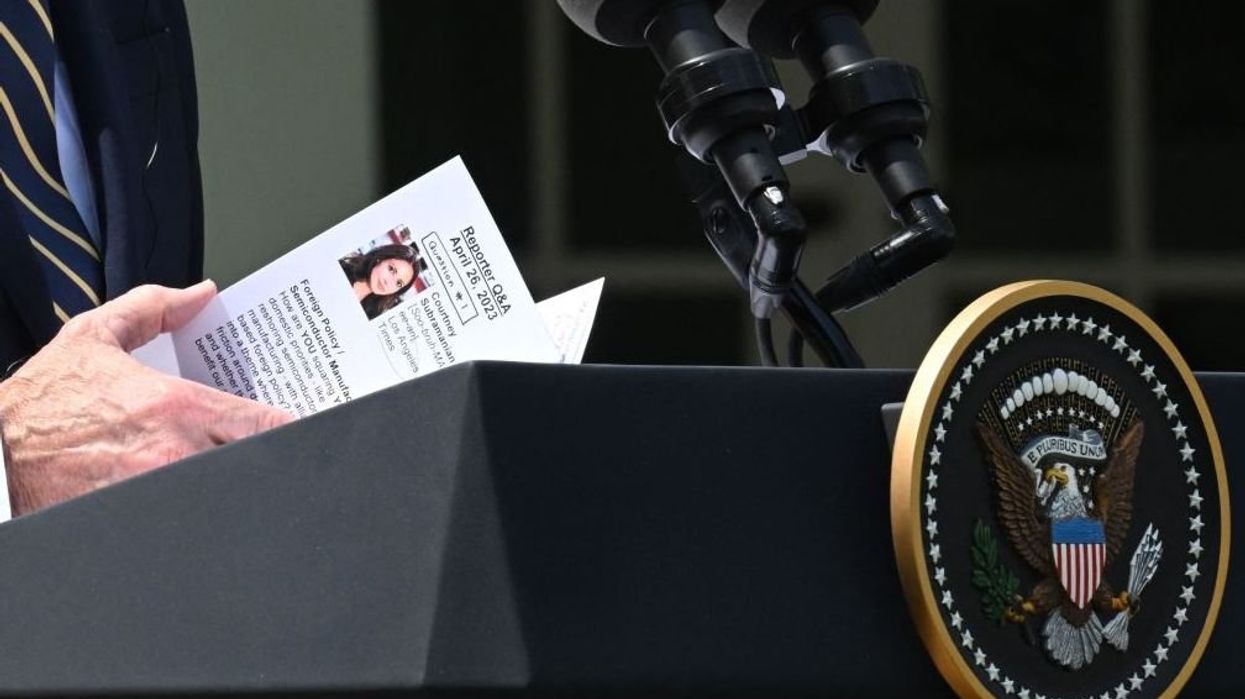 Crafty photographer catches Biden's cheat sheet showing advance knowledge of reporter's question