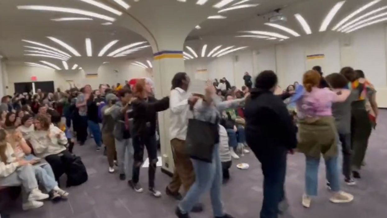 Crazed leftists desecrate Bible, form conga line, sing Miley Cyrus song to disrupt free speech event