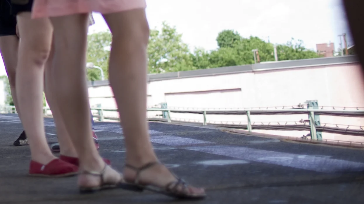 Creep grabs young woman waiting for train and tells her, 'You're mine now.' But men nearby aren't about to let that happen.
