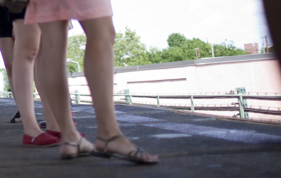Creep grabs young woman waiting for train and tells her, 'You're mine now.' But men nearby aren't about to let that happen.