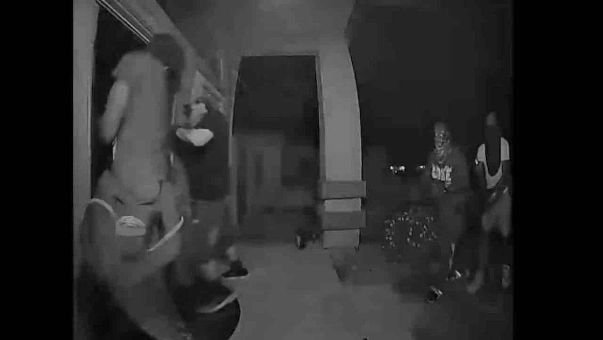 Crooks break down home's front door in dead of night. But homeowner has a motion sensor — and a gun — just waiting for them.