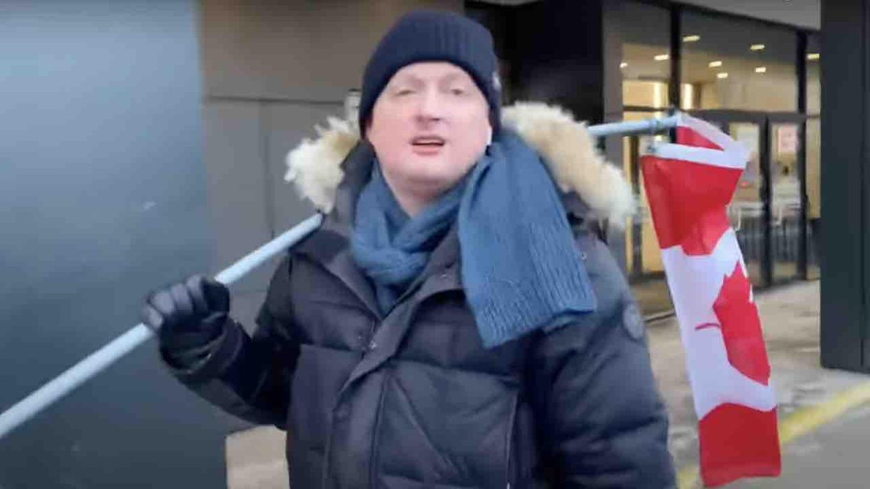 Dad confronts violent thug for stealing his 13-year-old daughter's Canadian flag amid Ottawa protests. Culprit ends up whimpering as cops handcuff him.