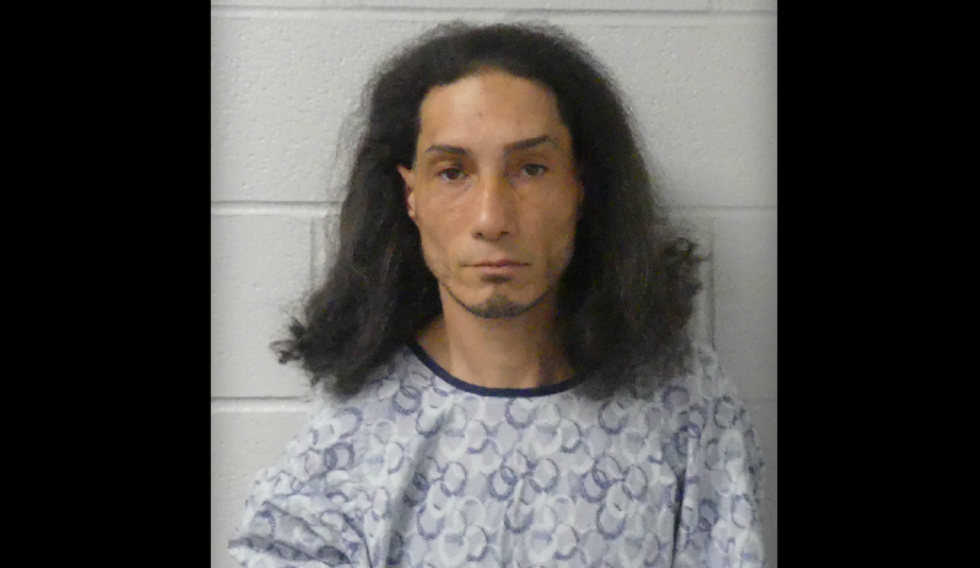 Dad making delivery sees carjacker entering his vehicle — and his child also is inside car, cops say. Things soon get primal.