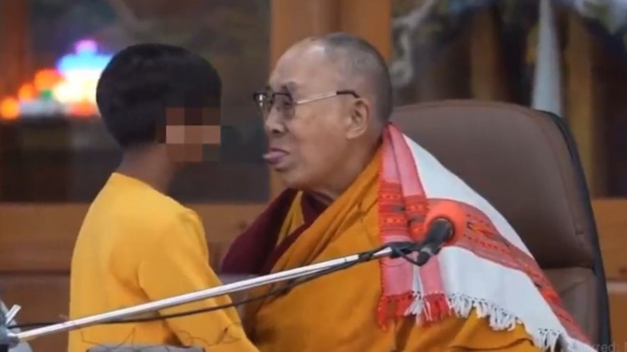 Dalai Lama apologizes for kissing little boy, asking him to 'suck' his tongue
