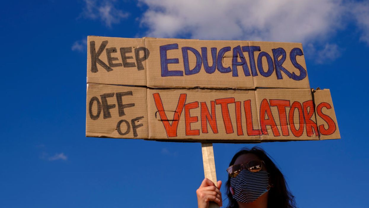 DC teachers line up ‘body bags’ and signs to protest potential return to school