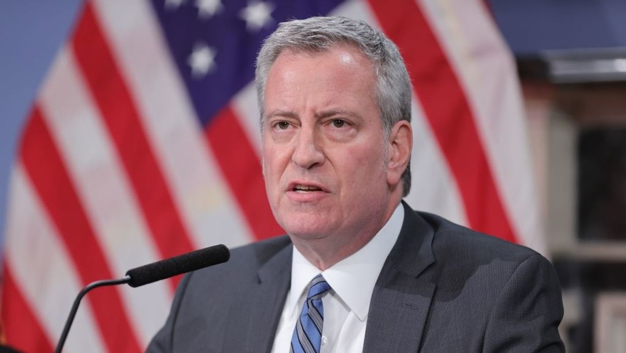 De Blasio says cop who pulled gun on protesters should be fired. Then a full video of incident surfaced.