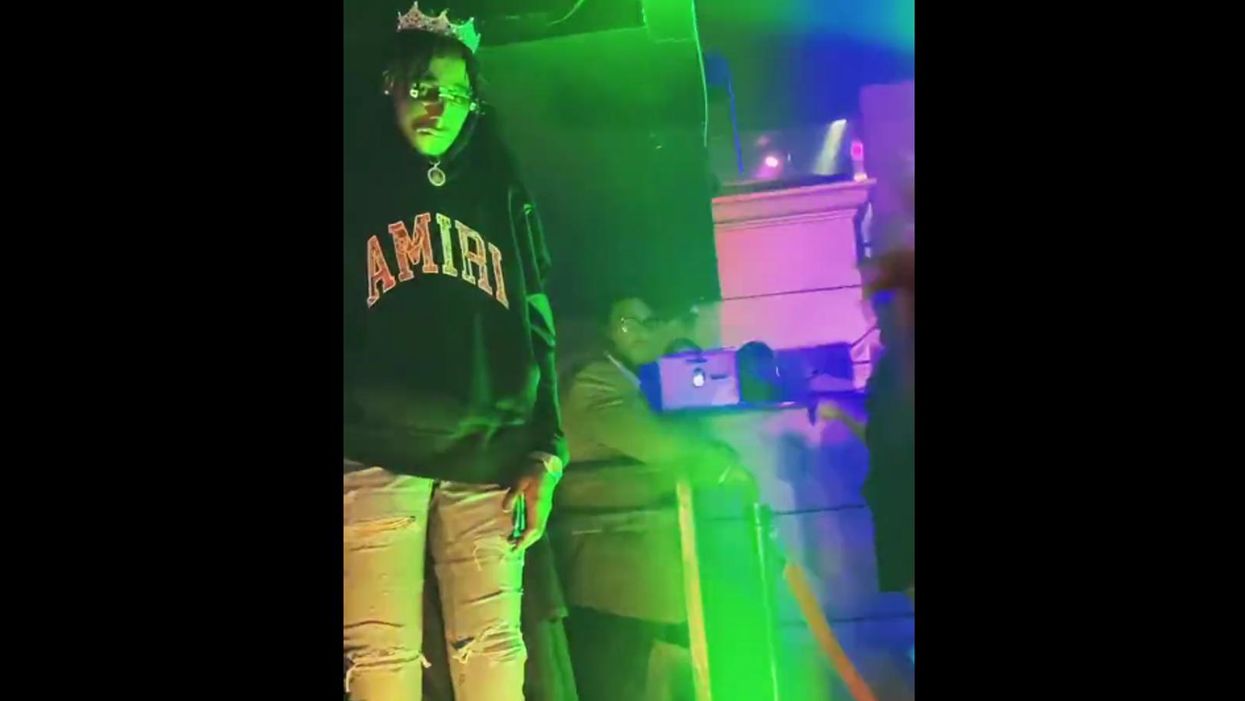 Dead rapper's weeks-old corpse propped up on display during bizarre ...