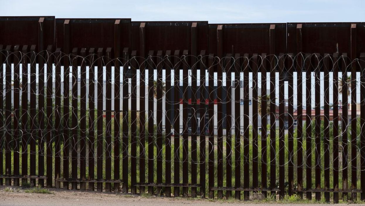 Dead woman found hanging from US border wall in Arizona