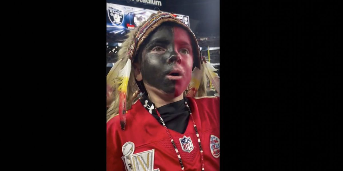 NextImg:Deadspin, other media outlets ripped young Chiefs fan for wearing 'black face,' headdress. His mom says he's Native American. | Blaze Media