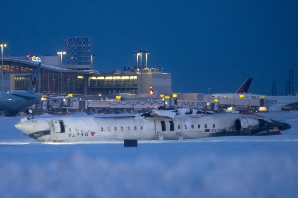 Delta Air Lines offers compensation with 'no strings attached' to passengers of plane that flipped upside down in Canada