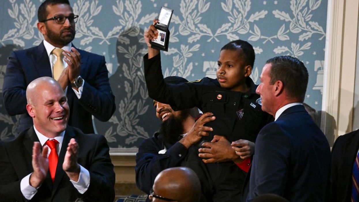 Democrats protest while Trump makes dream come true for boy with brain cancer