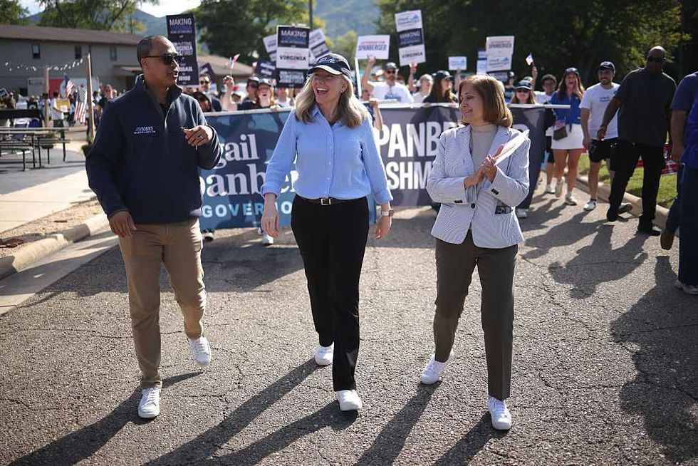 Democrats stand by their man despite vicious texts wishing death on GOP rival and his kids