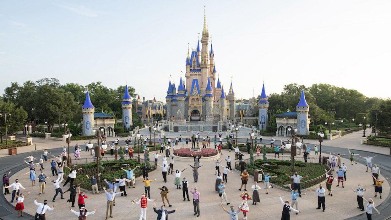 Disney employees march through Disney World to protest company's vaccine mandate
