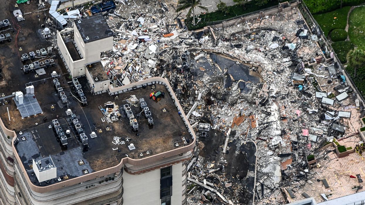 Distraught family says missing loved ones' landline has called at least 20 times from the rubble at Champlain Towers South
