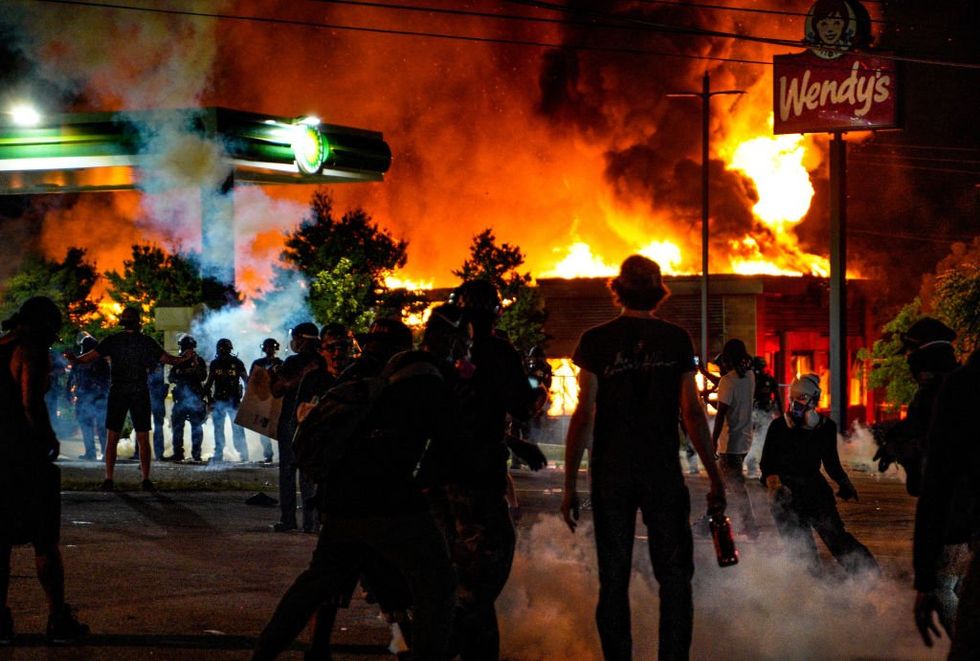 Duo plead guilty to burning down Atlanta Wendy's during BLM riot; face no jail time and a $500 fine