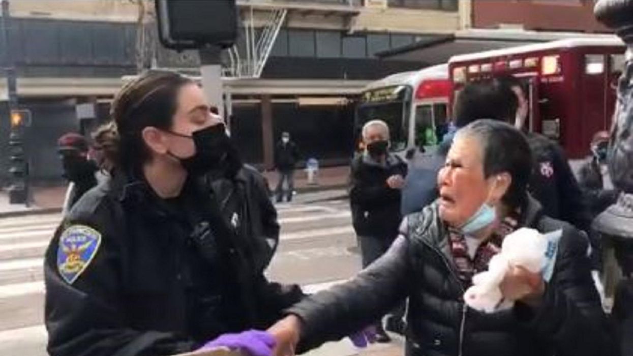 Elderly Asian woman sends thug away on stretcher after he allegedly punched her in unprovoked attack