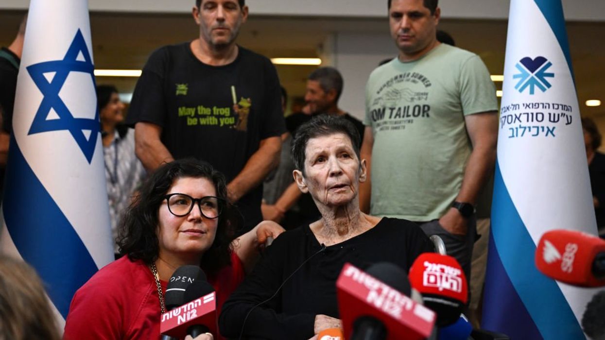 Elderly Hamas hostage released, says she was beaten and made to walk for miles through underground tunnels