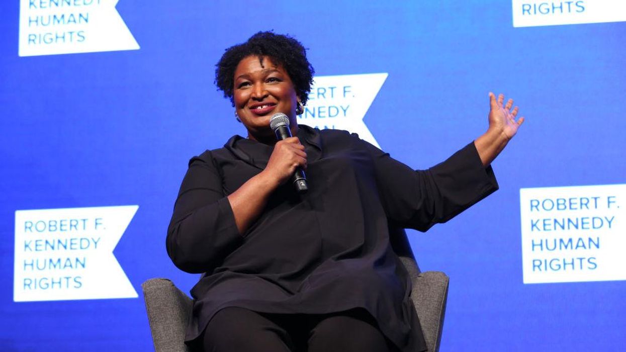 Elementary school principal silent when asked to explain why kids were forced to mask up but Stacey Abrams wasn't