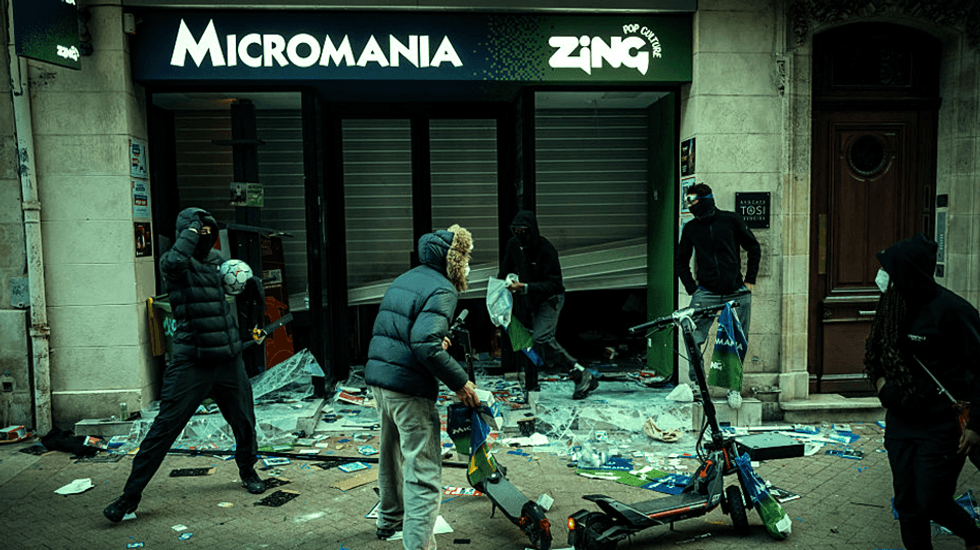 Employee at French GameStop store goes viral in heroic 'battle' against rampaging rioters
