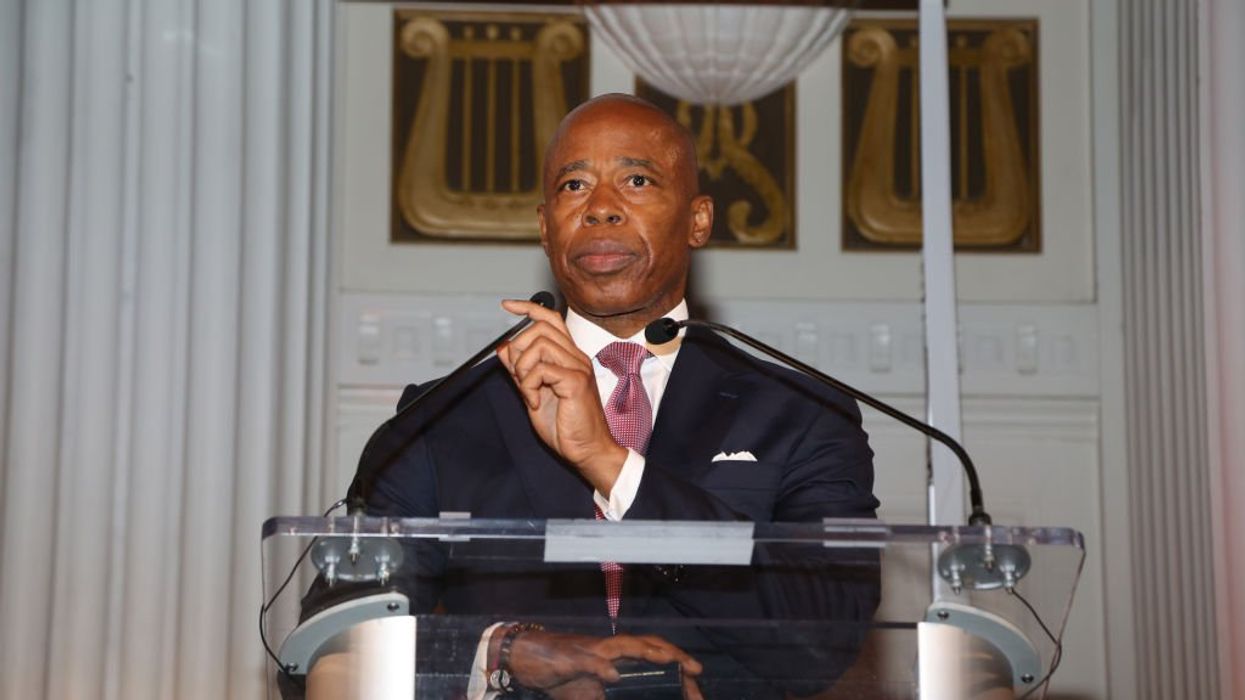 Eric Adams reverses course after heckling over housing migrants in luxury apartments with marble bathrooms