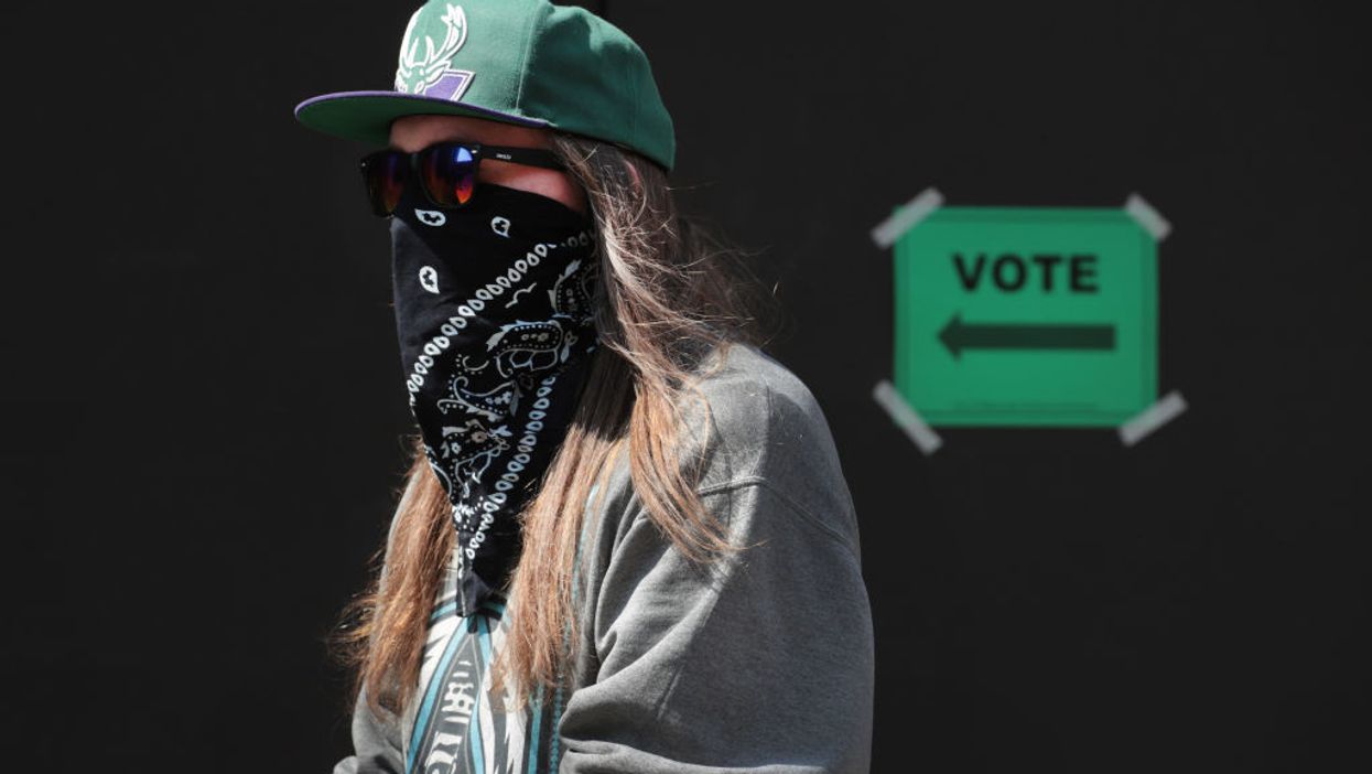 Experts surprised to find no evidence of COVID-19 spike from Wisconsin's in-person voting