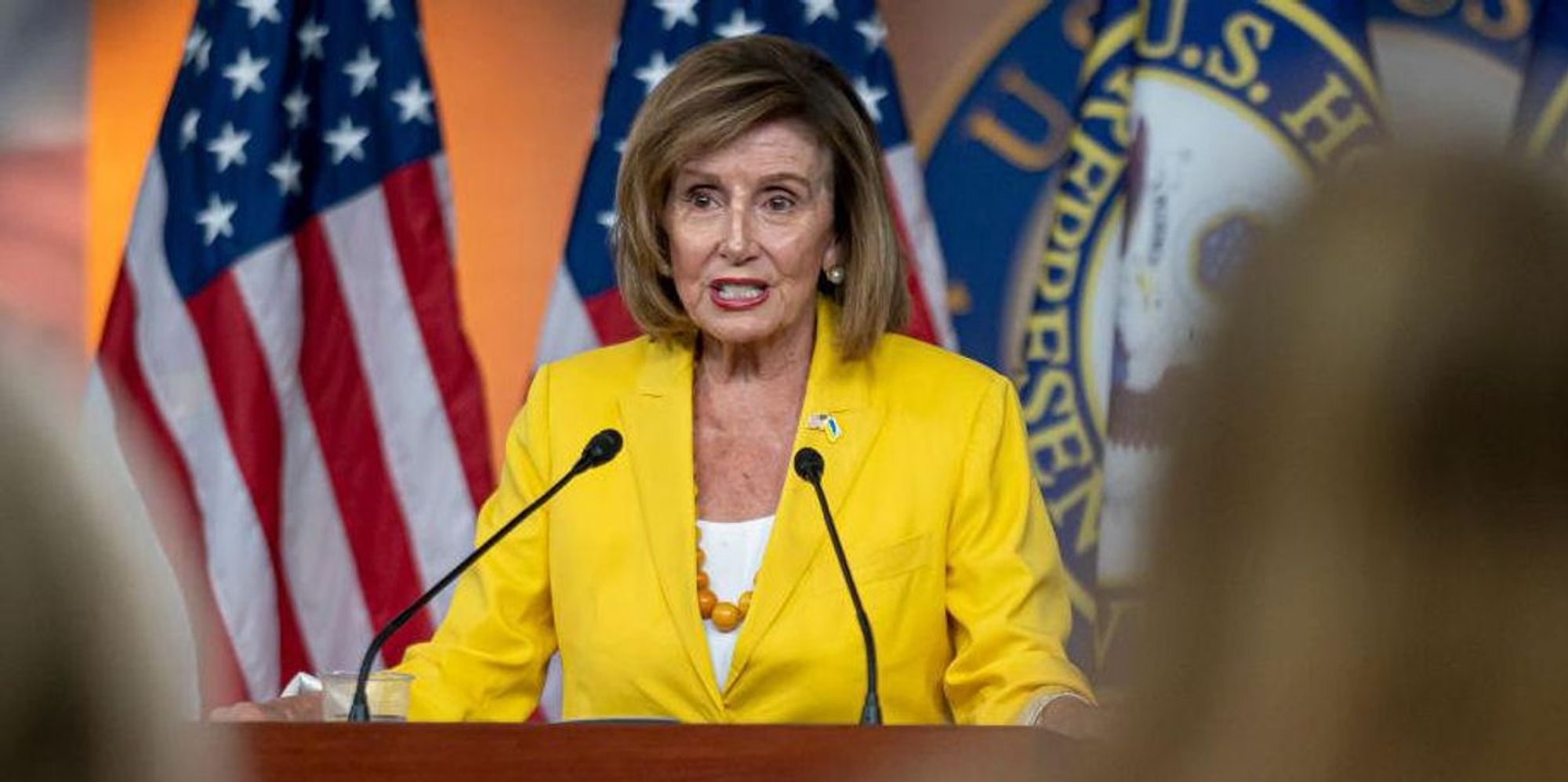 Reporter confronts Nancy Pelosi about husband's controversial stock purchases. Her reaction says it all.