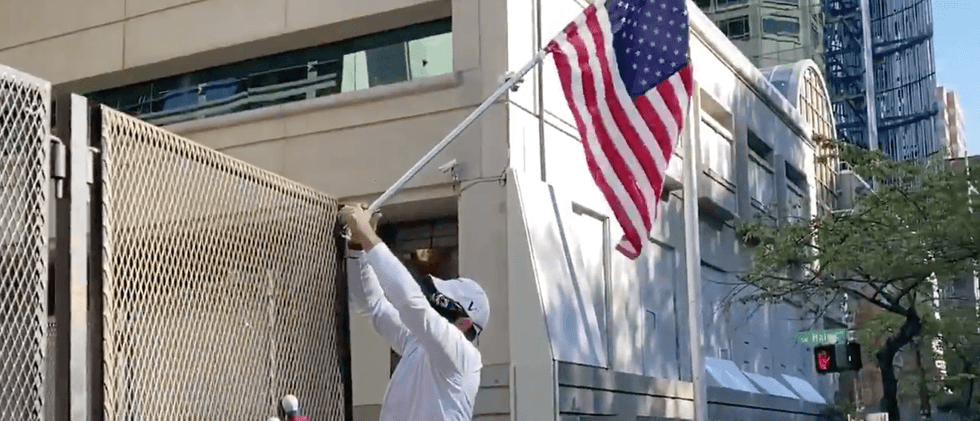 ‘We All Should Be Patriotic’: Veteran Hangs American Flags At Portland Courthouse