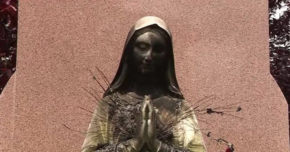 Watch: Catholics Hold Vigil at Virgin Mary Statue Torched by Vandals