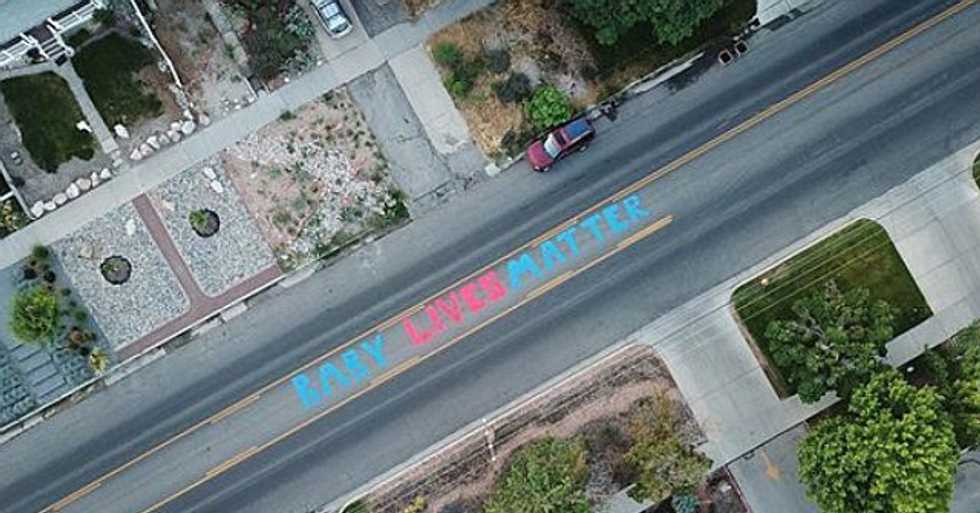 Pro-Life Artist Paints ‘Baby Lives Matter’ in Front of Planned Parenthood
