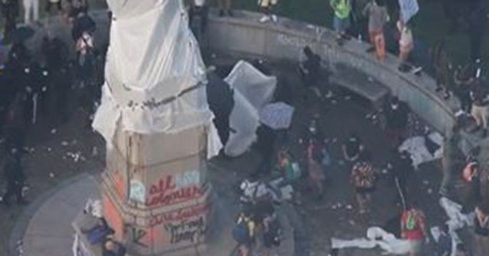 VIDEO: Twelve Protesters Arrested After Clash with Chicago Cops over Columbus Statue